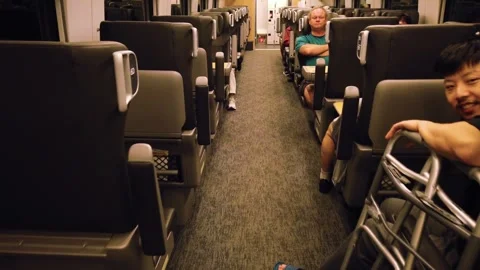 Walking through the interior of a train carriage on the Montreal - Toronto route 스톡 동영상 318189123