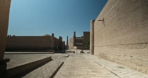Walking through Khiva Old town. Itchan Kala, Arab Muhammadhan Madrasah, Islam Stock Footage 286050011