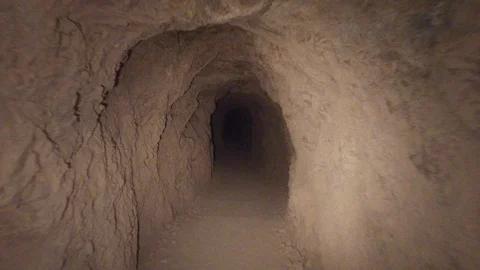 Walking Through Long Dark Mine Tunnel Видео 129223539