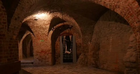 Walking through the medieval basement of Leśnica Castle, Poland Stock Footage 338396379