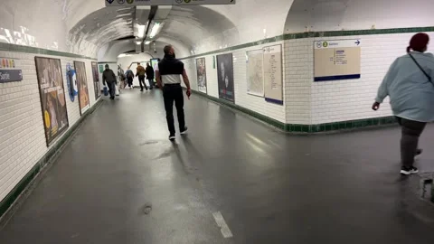 Walking through Metro subway station in Paris, France Stock Footage 242371246