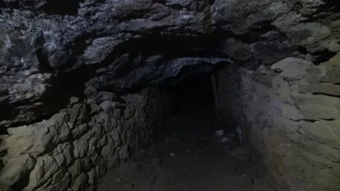 Walking through the mine tunnel Video stock 163590956