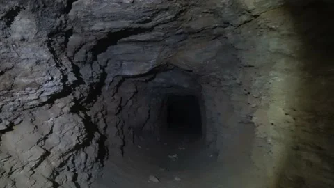 Walking through the mine tunnel Stockbeeldmateriaal 163591119