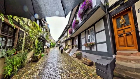 Walking Through Narrow Half-Timbered Street With Pedestrians Video stock 344571035