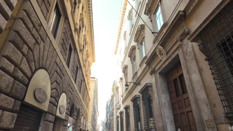 Walking through narrow historic streets in downtown Rome Stock Footage 339779394