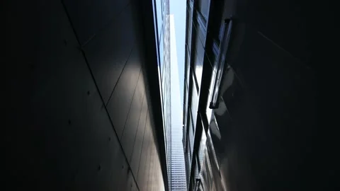 Walking through narrow path. Tiny sky above. Stock Footage 220094245