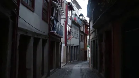 Walking through narrow street Stock Footage 69109694