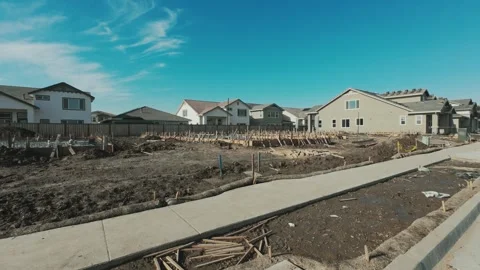Walking through new development under construction Stock Footage 295008373