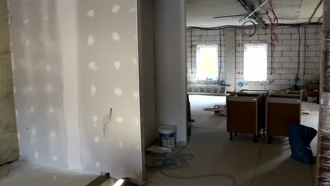 Walking through an office under construction Stock Footage 112651997