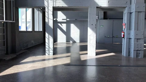 Walking through an old and empty renovated factory Stock Footage 106826951