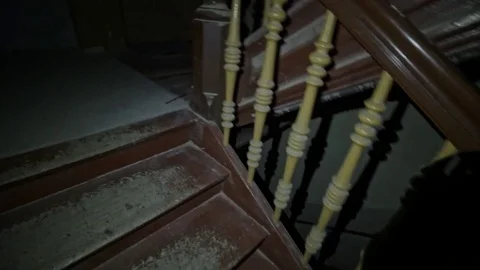 Walking through old house with a flashlight Stock Footage 78356083