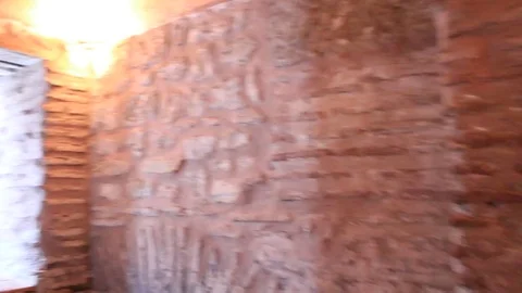 Walking through old medieval corridor Stock Footage 83557334