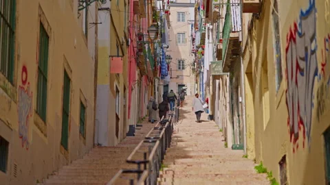 Walking through the old narrow streets of Lisbon. Lisbon, Portugal, 25 March Stock Footage 305417488