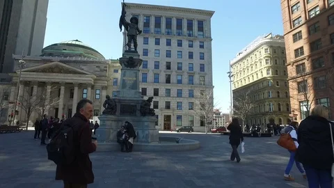 Walking Through Place d'Armes Between  St-Jacques St and Notre-Dame St, Montreal Stock Footage 75821533