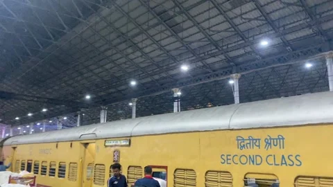 Walking through a platform of Chennai railway station Stock Footage 234248765