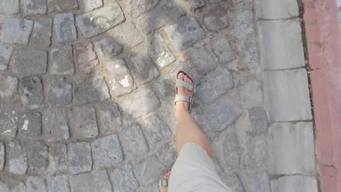 Walking through a quaint cobblestone street in a historic town during the s.. Stock Footage 313634720