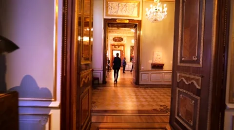 Walking through the rooms with exhibit items in Hermitage Museum, St Petersburg Stock Footage
