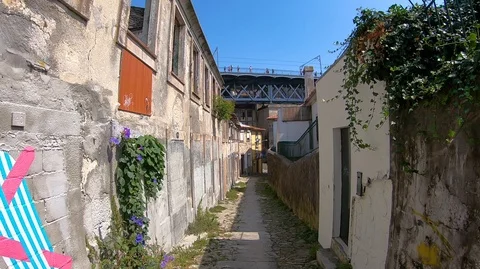 WALKING THROUGH SENHORA DAS VERDADES STREET, PORTO, PORTUGAL Stock Footage 94759899