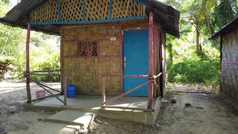 Walking through a simple guest house complex also known as a resort in the Stock Footage 144689403