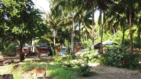 Walking through a simple guest house complex also known as a resort in the Stock Footage 144689501