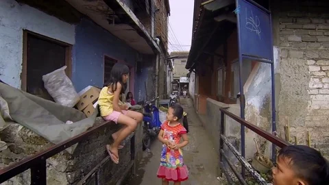 Walking through a slum in Indonesia Stock Footage 75886698