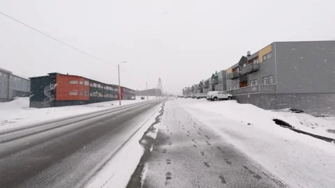 Walking Through Snowfall in Longyearbyen, Svalbard Stock Footage 339277538