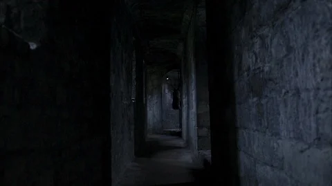 Walking through a stone Castle corridor Video stock 128605616