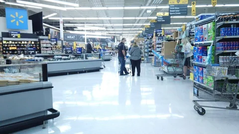 Walking Through A Store During Pandemic Video stock 128609137