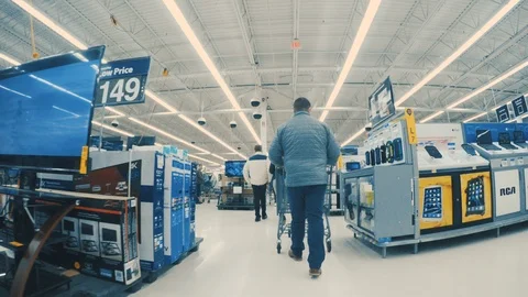 Walking Through Store's Electronic Section LUT Applied Stock Footage 103165863