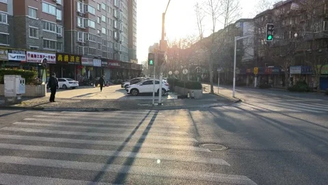 Walking through the streets of Shanghai in the sun in the morning Stock Footage 139537016