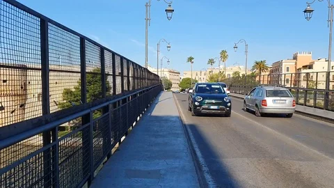 Walking through the Swing Bridge on the Taranto Canalboat, in the South of Italy Stock Footage 116014110