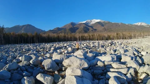 Walking through the territory of the mudslide. Slow motion Stock Footage 126620740