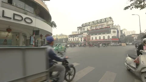 Walking through traffic in old quarter of Hanoi city, Vietnam on March 2016 Stock Footage 132087084