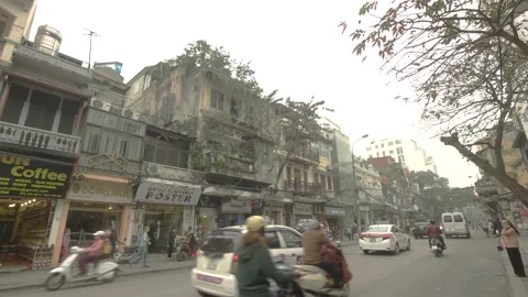 Walking through traffic in old quarter of Hanoi city, Vietnam on March 2016 Stock Footage 132087111