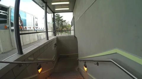 Walking through train station tunnel - POV - Action camera Stock Footage 68999806