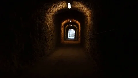Walking through a tunnel in the mountain Video stock 107824119