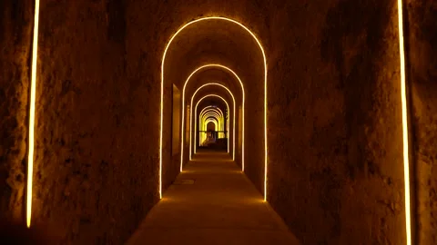 Walking through The Tunnel with yellow lights Stock Footage 234430971