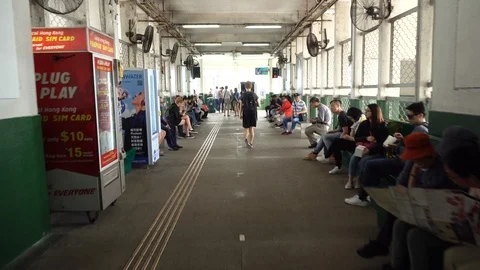 Walking Through Turngate Using Tickets At Star Ferry Harbour - Hong Kong Stock Footage 90342192