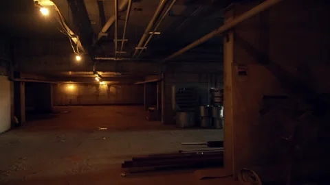 Walking through an underground basement Video stock 132355897