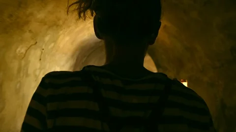 Walking through an underground tunnel of the world war Stock Footage 126063570