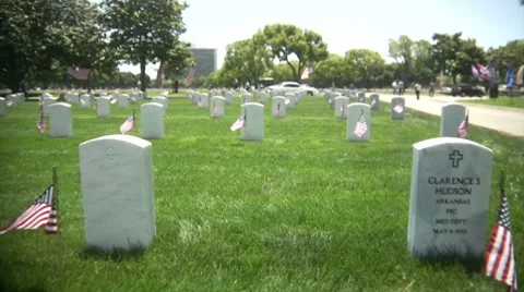 Walking through Veteran's Cemetery Video stock 7736843