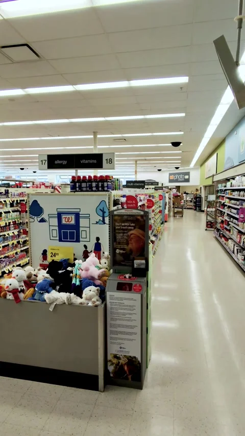 Walking Through a Walgreens Pharmacy Store Aisle, Leland, NC, Vertical Stock Footage 346920220