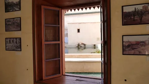 Walking through a window in Le Jardin Secret, Marrakech Video stock 132340285