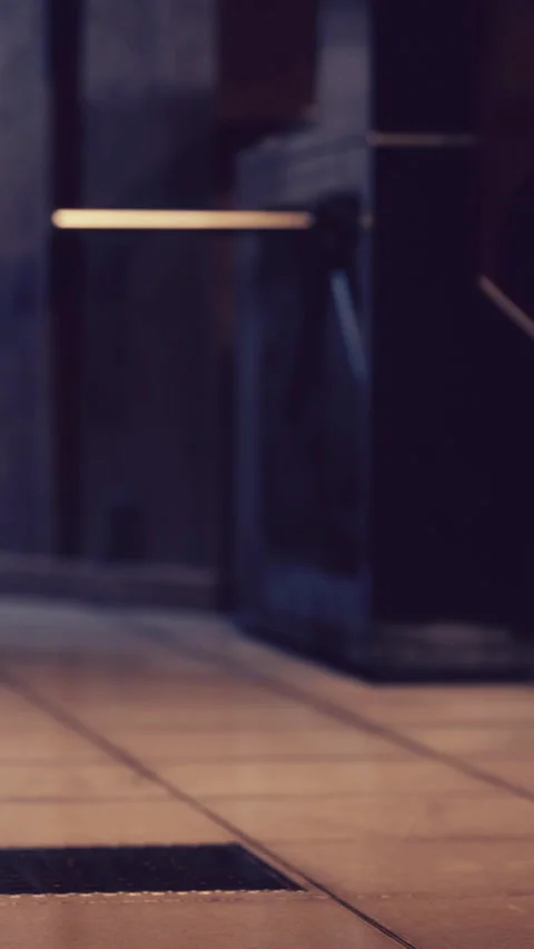 Walking on tile floor in a building with light coming from above Stock Footage 346678195