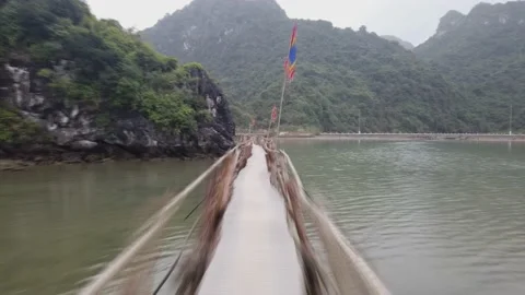 Walking timelapse on a floating bridge in Vietnam, beautiful mountains Video stock 147487414