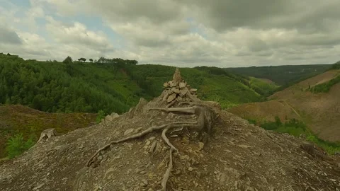 Walking on top of the hill with a stone tower on it with a nice view. Stock Footage 247135105