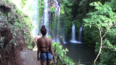 Walking toward a beautiful waterfall Stock Footage 146151219