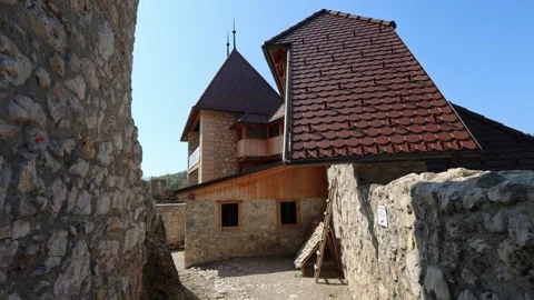 Walking Toward the Castle Tower Between Ancient Walls at Grad Žovnek Stock Footage 282671818
