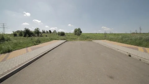 Walking toward end of the road Video stock 76396174