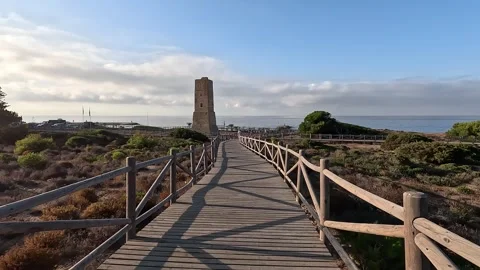 Walking towards an ancient tower Stock Footage 283276804